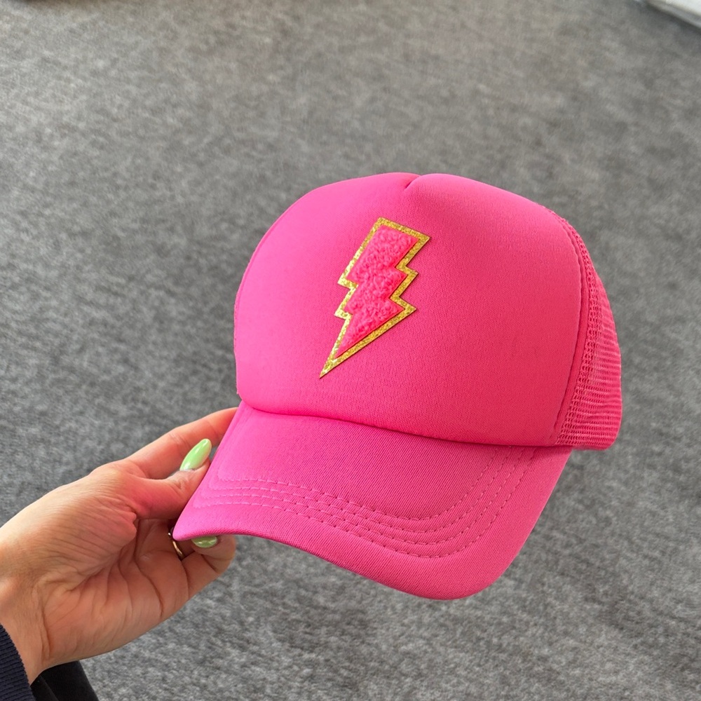 Hot pink lightning bolt trucker hat